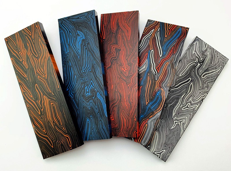 Composite material sheets and machined parts